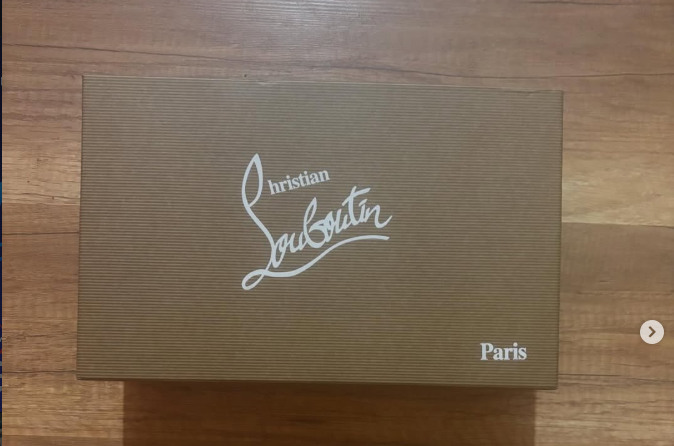 Christian Louboutin Black Spiked Sneakers – Premium Designer Shoes with Red Sole